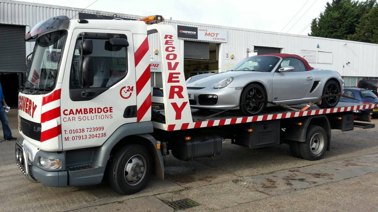 porche car recovery with flatbed truck